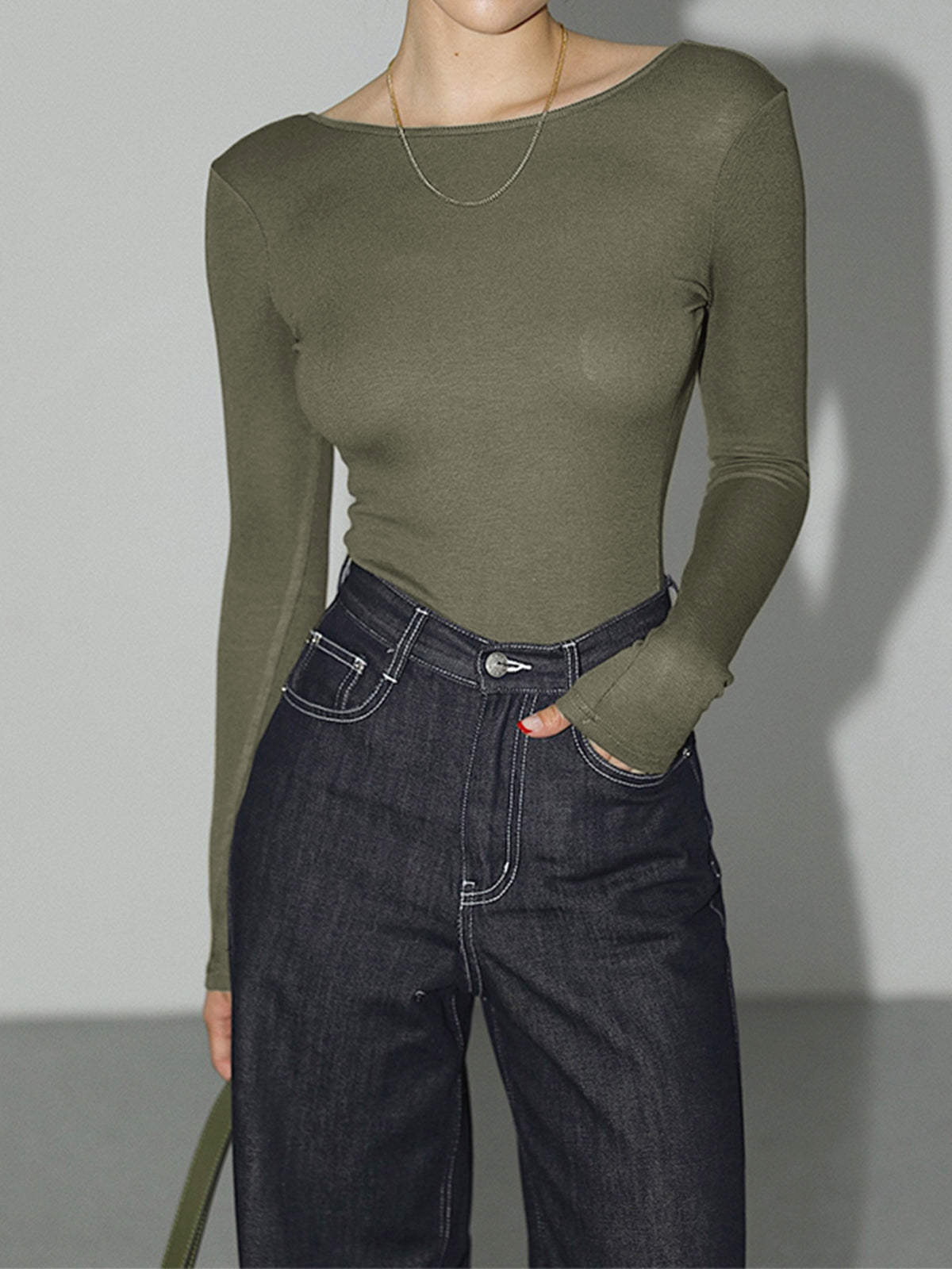 Ensfarget bodysuit med åpen rygg