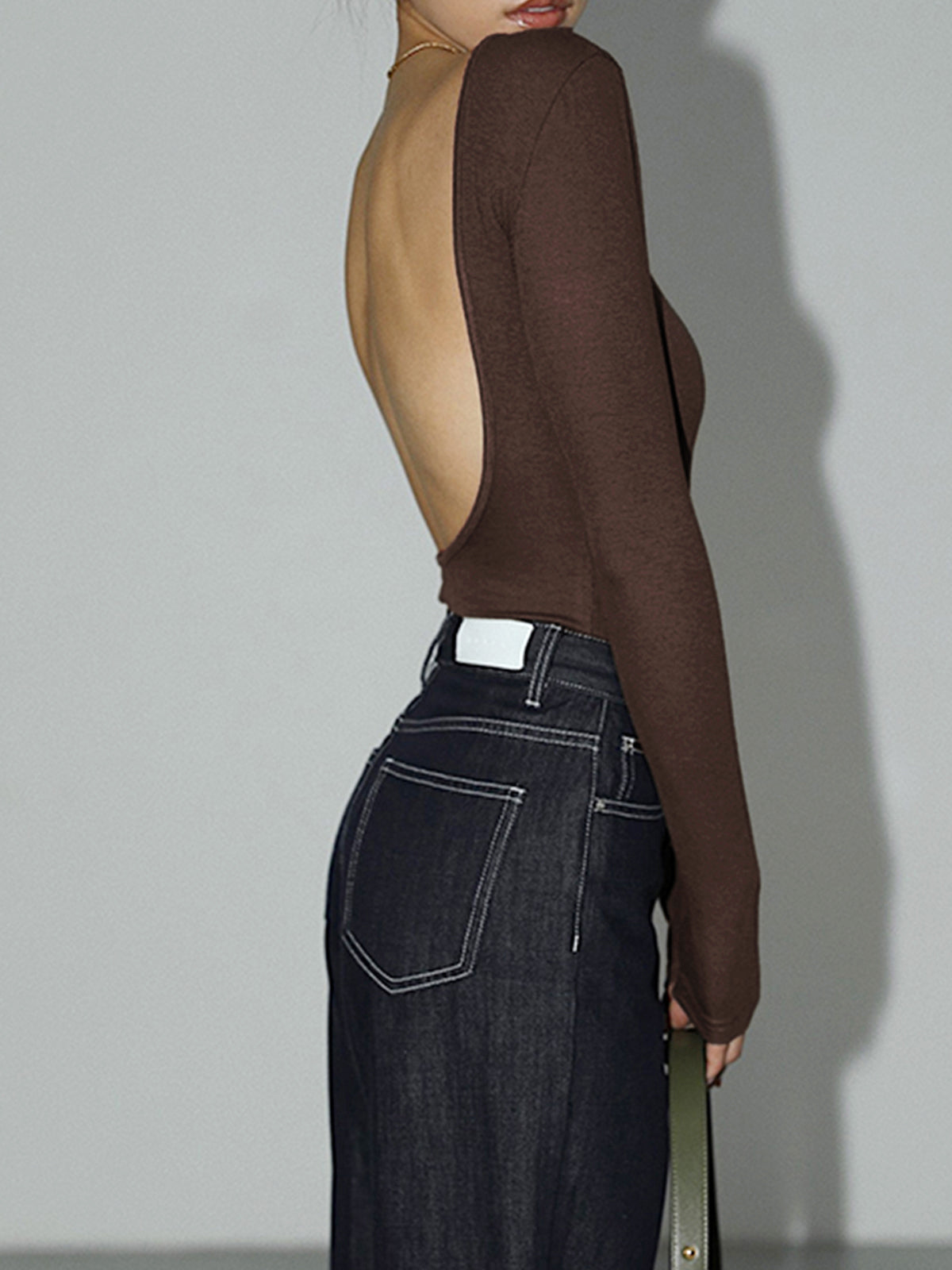 Ensfarget bodysuit med åpen rygg