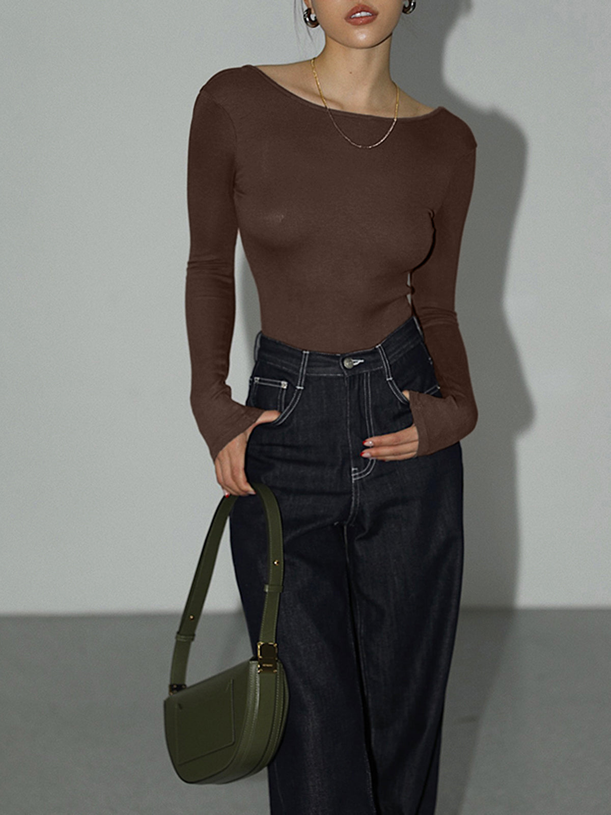 Ensfarget bodysuit med åpen rygg