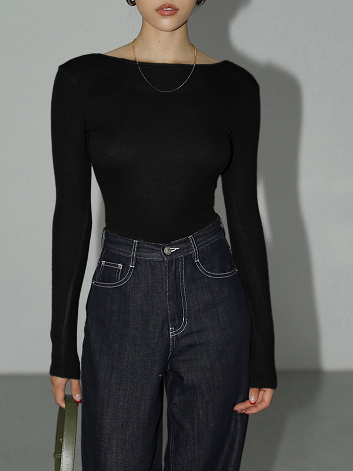 Ensfarget bodysuit med åpen rygg