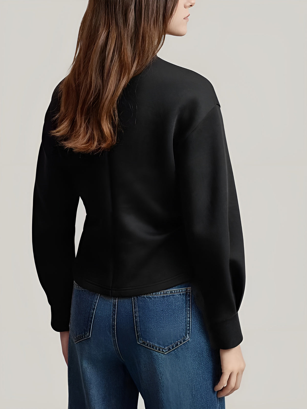Ensfarget bluse med glidelås og splitt