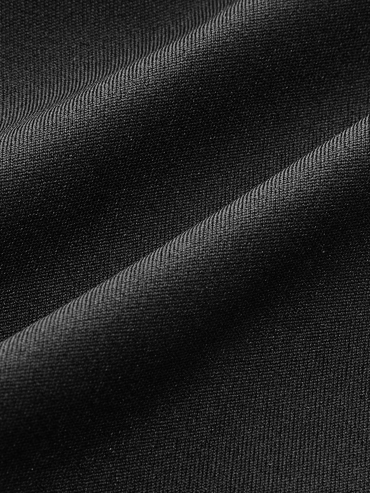 V-hals halterneck tanktopp med åpen rygg