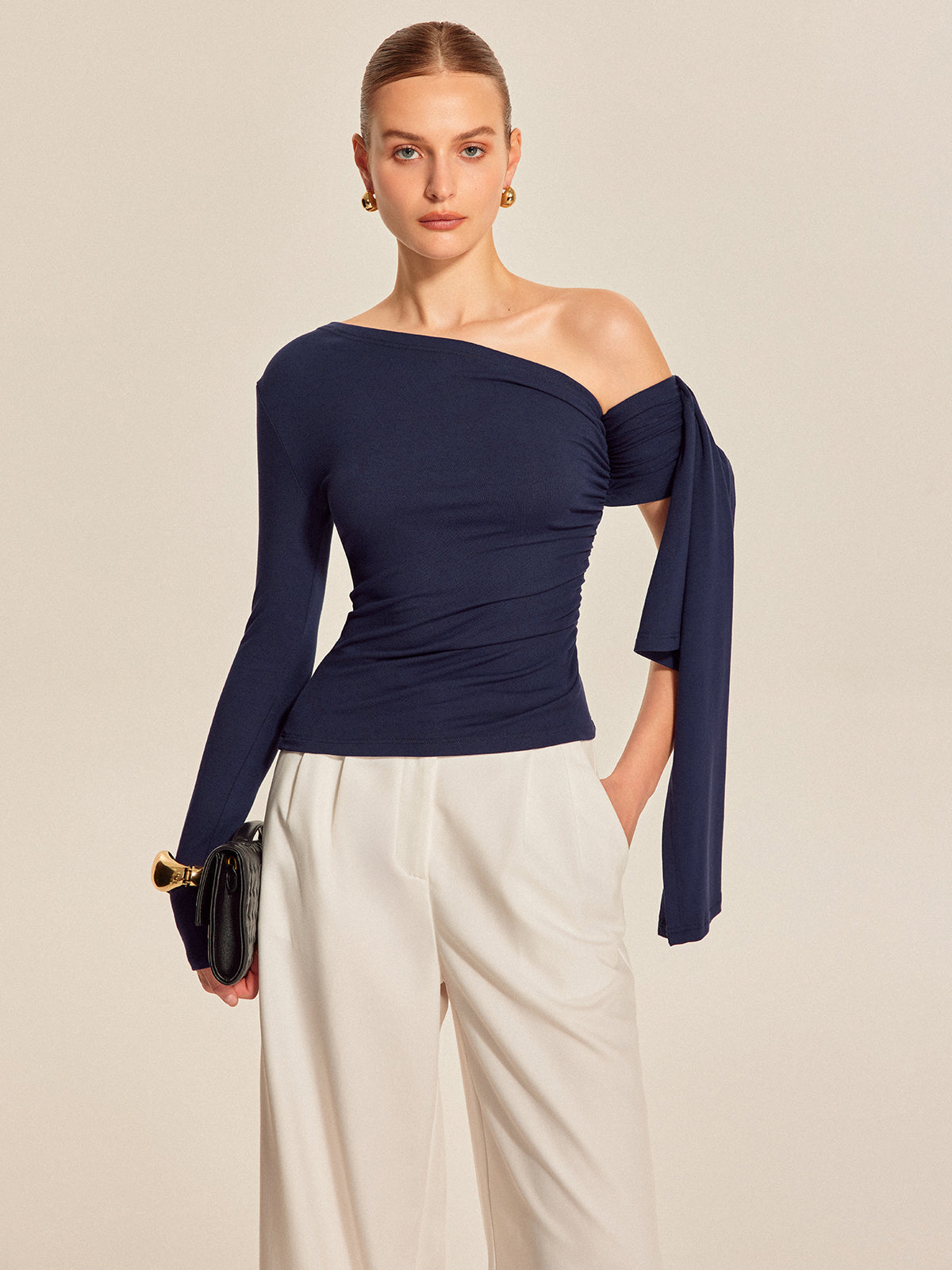 Asymmetrisk topp med draperingar