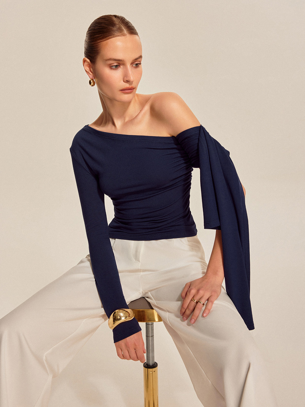 Asymmetrisk topp med draperingar
