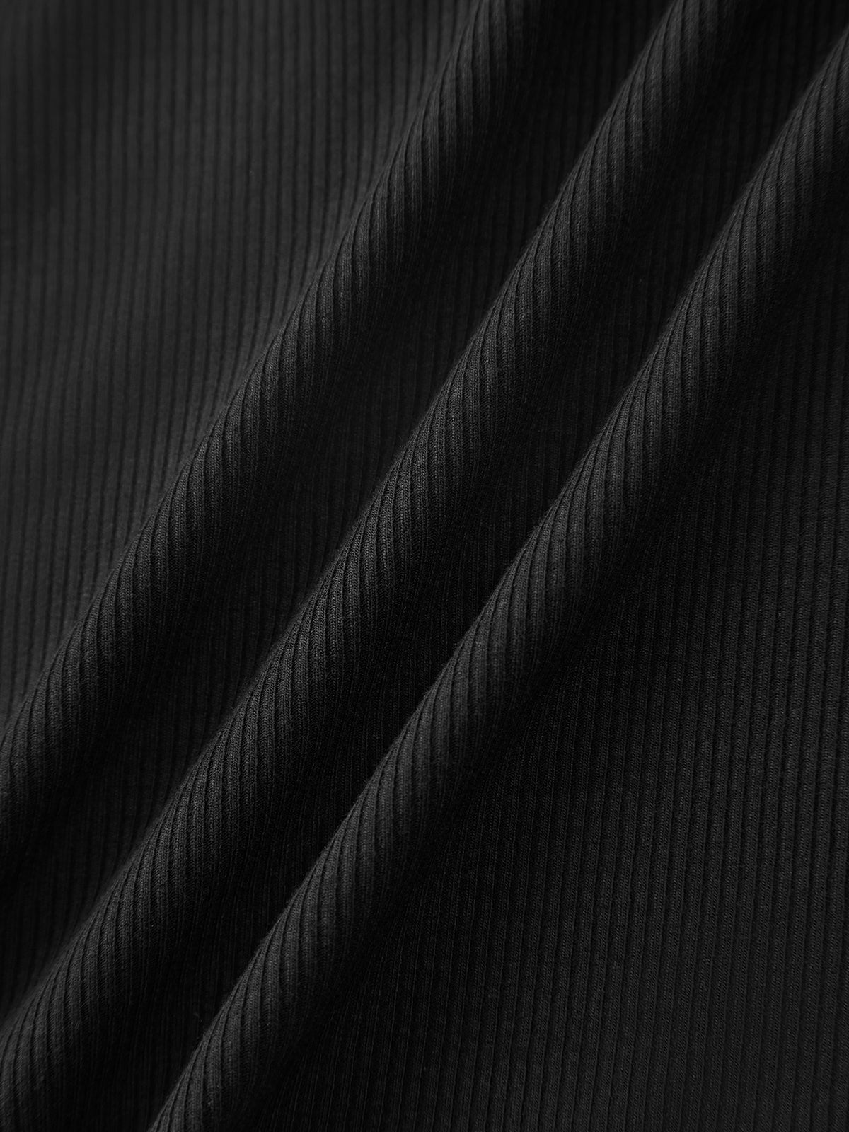 Asymmetriskt linne med halterneck 