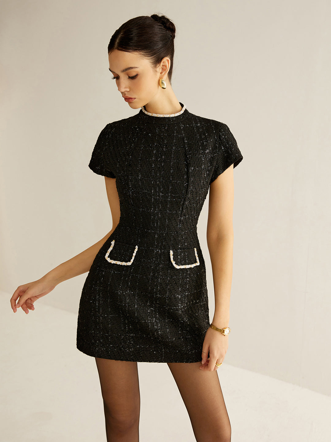 Elegant kortermet tweedkjole 