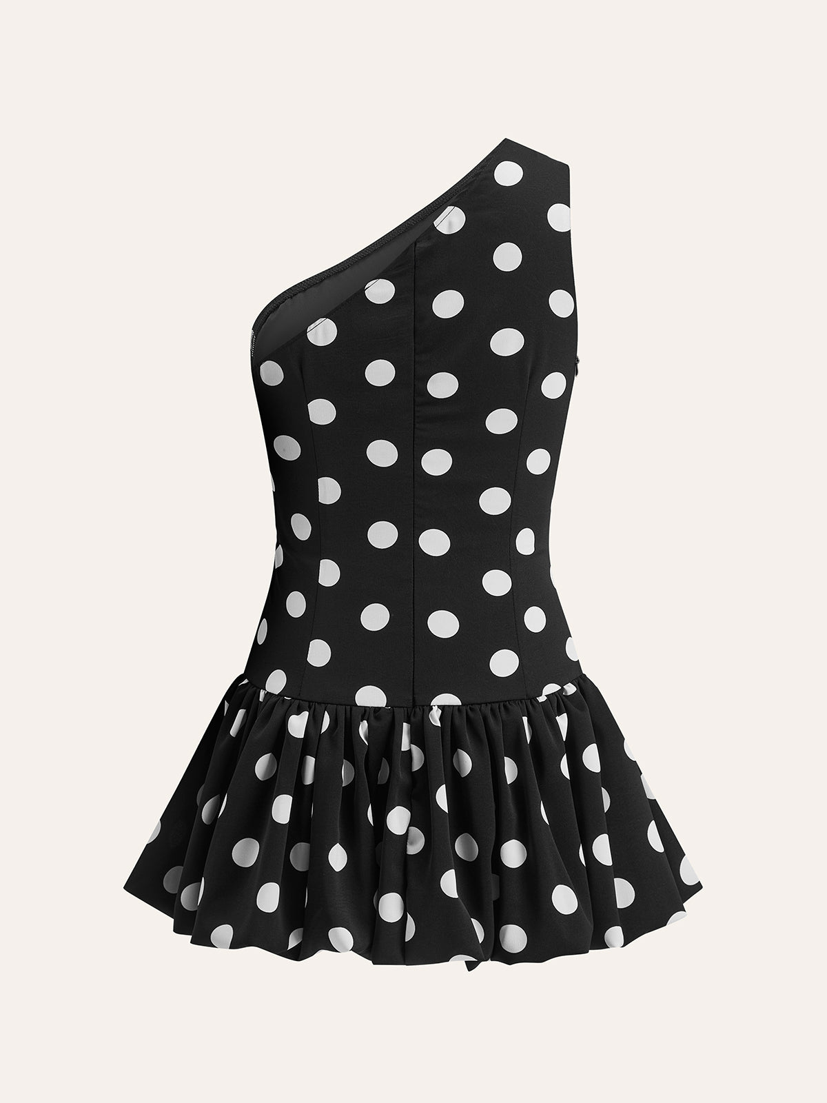 Kjole med én skulder og prikker i peplum 